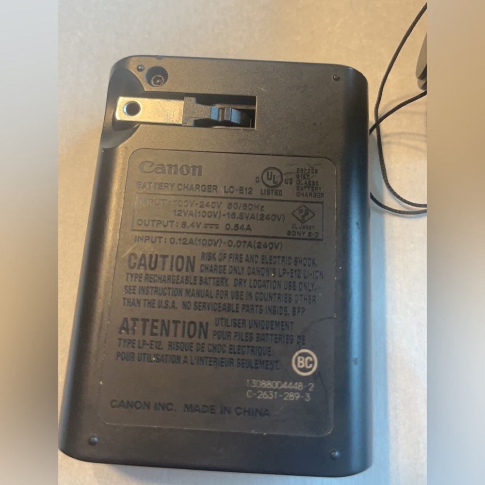 Cannon Camera Charger + Battery
